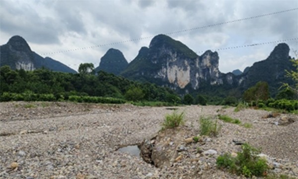 覆绿石漠，守护暗河：石漠化治理与地下河保护协同的典范